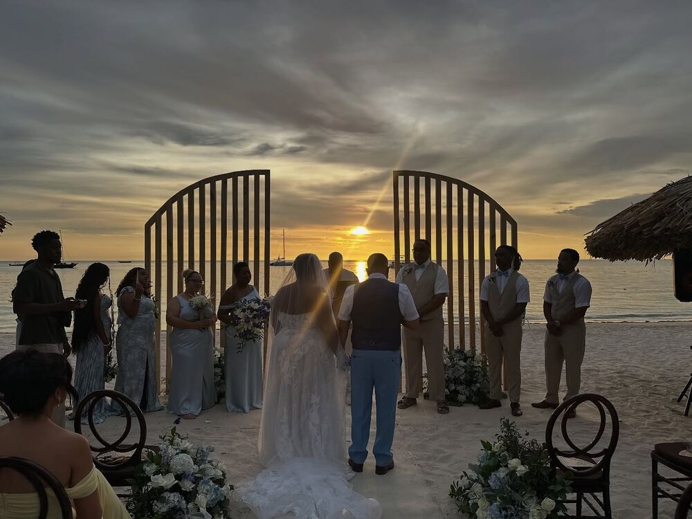 A wedding party at sunset